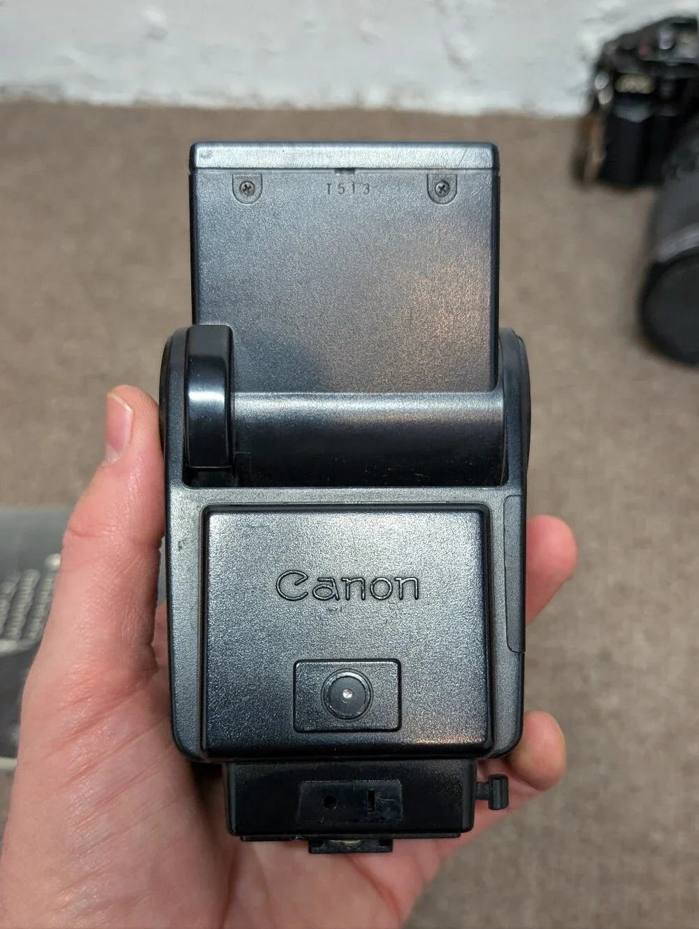 Vintage Canon A-1 Black SLR Camera with Black Lens and Black Flash